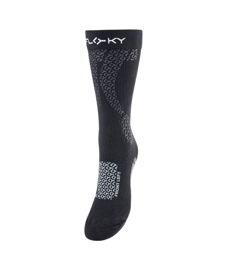 Side view of black Floky JUMPER medium-height compression sock with white FLOKY logo at cuff, grey honeycomb zone mapping pattern and FRONT LEFT foot designator text at arch, product shot on white background