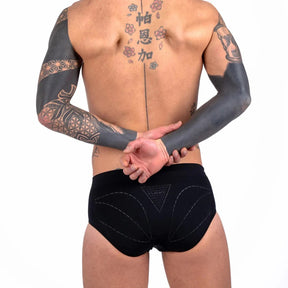 Model Wearing Floky Corelift Men's Briefs in Black Back